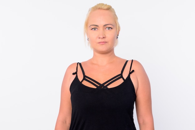 Studio shot of beautiful woman with blond hair isolated against white background