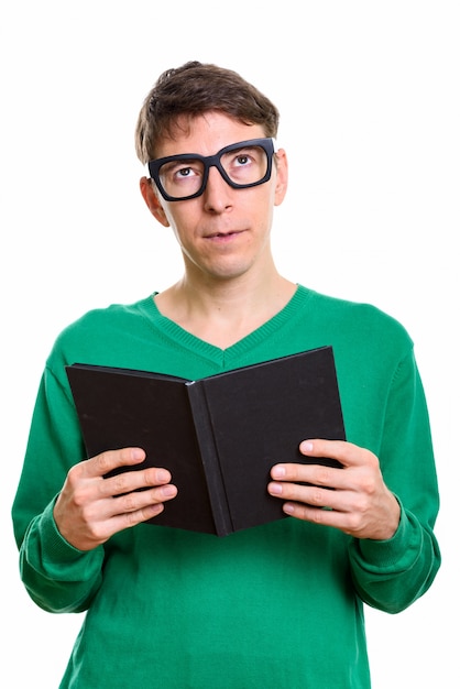 Studio shot of Caucasian man standing isolated against white background