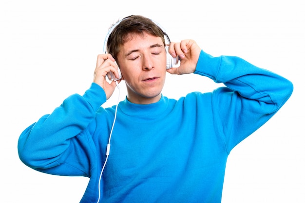 Studio shot of Caucasian man standing isolated against white background