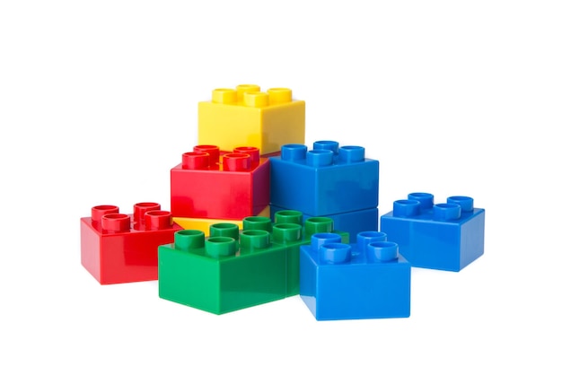 studio shot of colorful toy blocks against white background