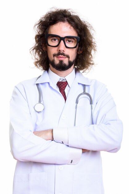 Photo studio shot of handsome man doctor with arms crossed