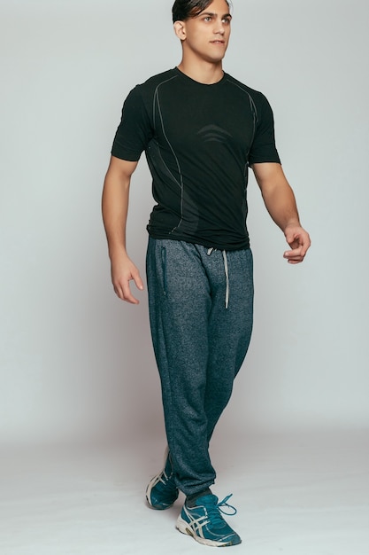 Studio shot of a handsome young man wearing tank top