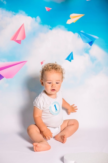 Studio shot of happy baby in diaper