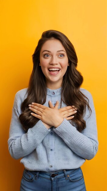 Studio shot of happy cute young woman folds arms on chest expresses gratitude swears or promises