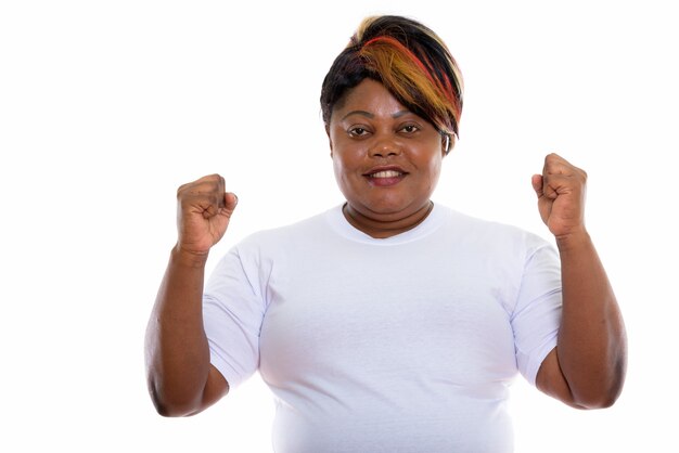 Studio shot of happy woman smiling