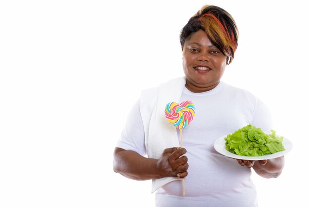 Studio shot of happy woman smiling