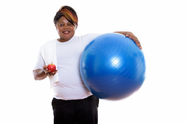 Studio shot of happy woman smiling