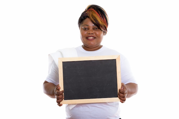 Studio shot of happy woman smiling