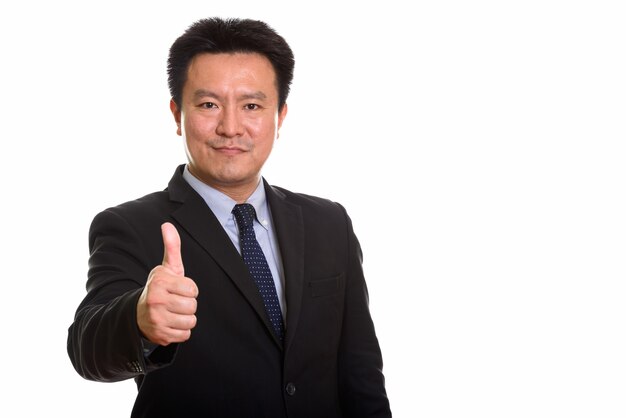 Studio shot of Japanese man isolated against white background