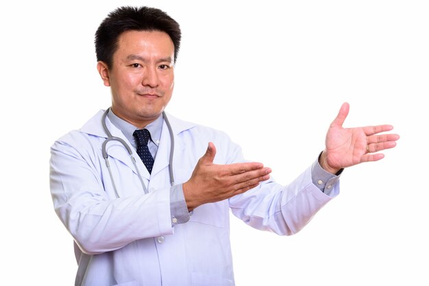 Studio shot of Japanese man isolated against white background