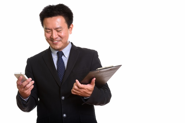 Studio shot of Japanese man isolated against white background