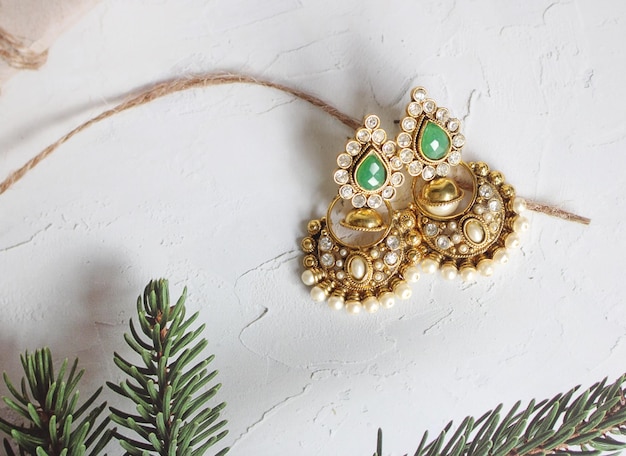 Studio shot photography traditional Indian earrings on white background