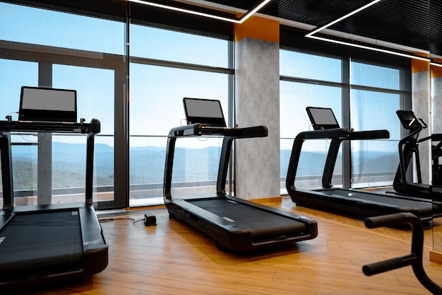 Studio shot of a professional treadmill in modern gym