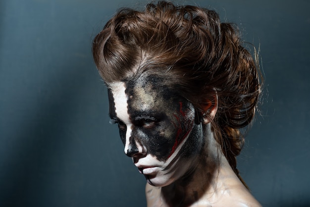 Studio shot of woman wears halloween makeup