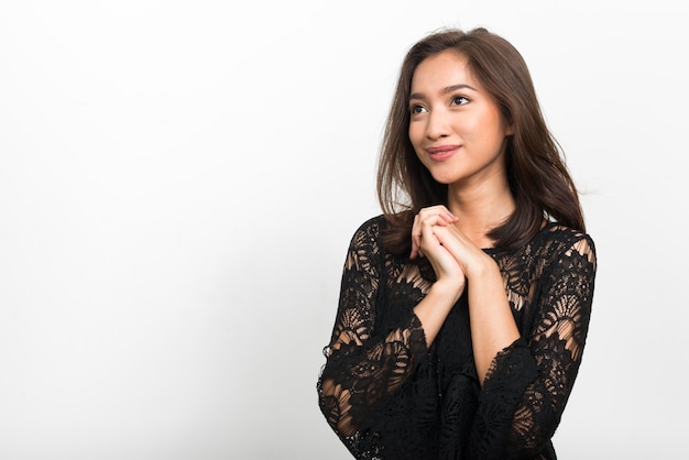 Studio shot of young beautiful Asian woman