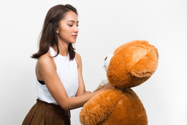 Studio shot of young beautiful Asian woman