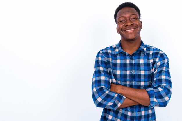 Studio shot of young handsome African man against white background