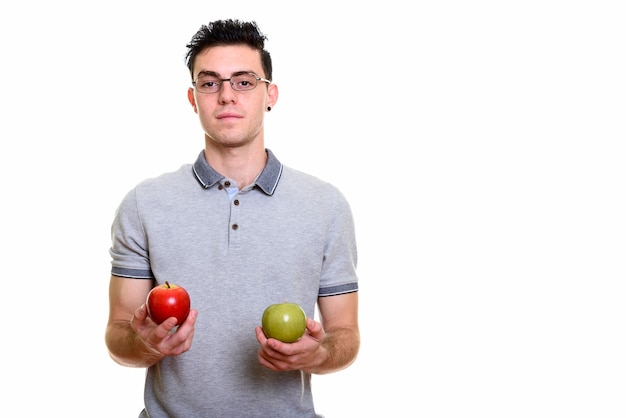 Studio shot of young handsome man isolated against white background