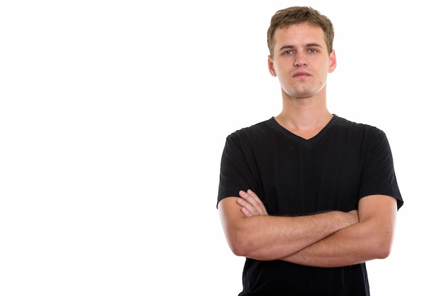 Studio shot of young man isolated against white background