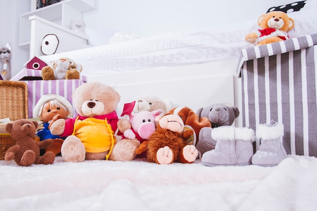 Stuffed animal toys in interior room