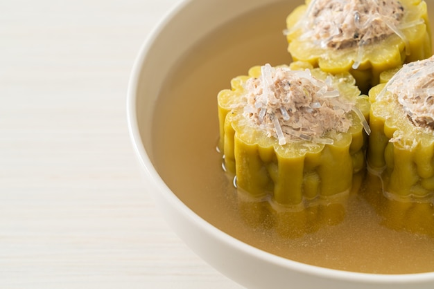 Photo stuffed bitter gourd with seasoned minced pork and vermicelli soup bowl