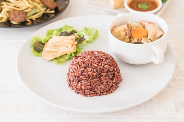 Stuffed cabbage soup with berry rice and tofu