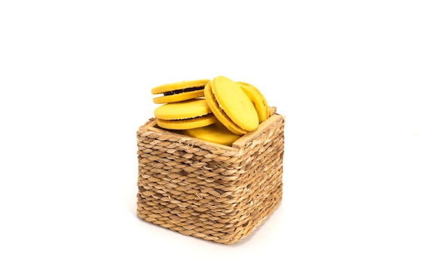 Stuffed cookies in a wooden box isolated on a white background