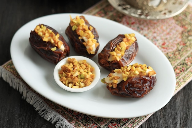 Stuffed Dates Fruit with Cream and Chopped Pistachio Nut