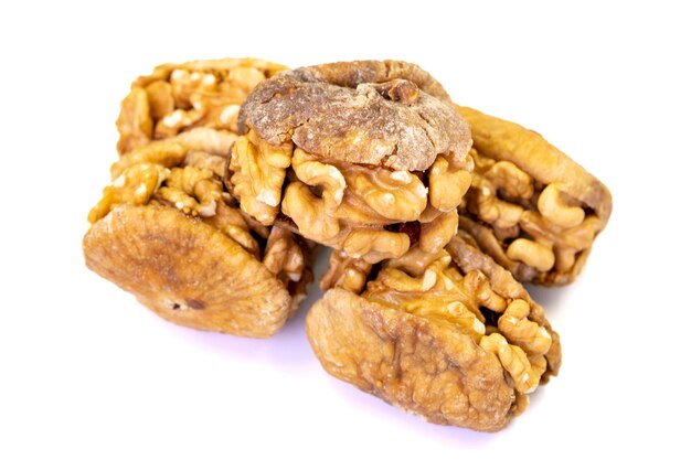 Stuffed dried figs Dried figs stuffed with walnuts isolated on white background Closeup local name cevizli incir