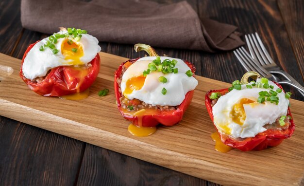 Stuffed peppers with mince meat topped with poached eggs