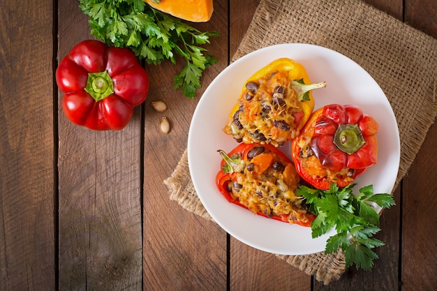 Stuffed peppers with rice, beans and pumpkin in the Mexican style