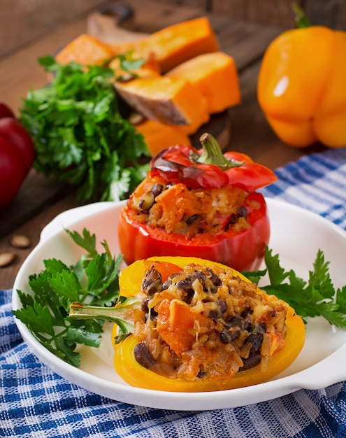 Stuffed peppers with rice, beans and pumpkin in the Mexican style