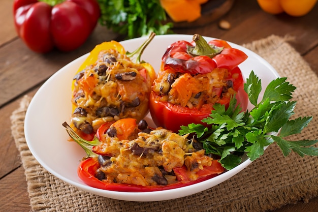 Stuffed peppers with rice, beans and pumpkin in the Mexican style