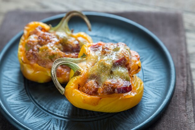 Stuffed peppers with sausages and mozzarella topping