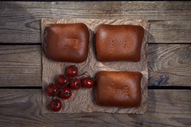 Stuffed pies on wood plaate