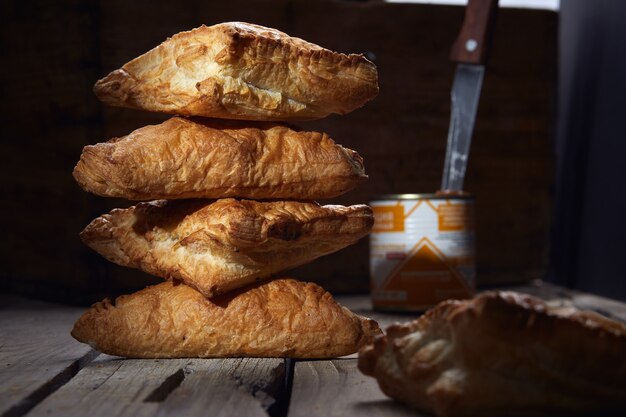 Stuffed pies on wood plaate