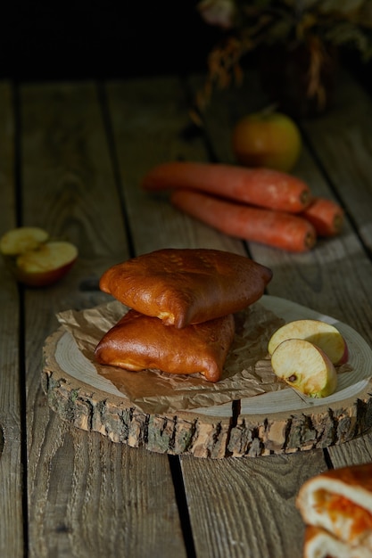 Stuffed pies on wood plaate