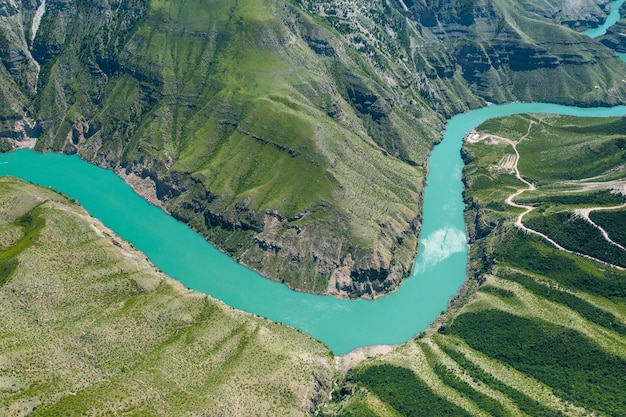 Stunning aerial view of Sulak canyon in Dagestan Curving turquoise river