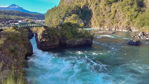 Stunning blue waters of petrohue river and rapids in puerto varas chile saltos del petrohue