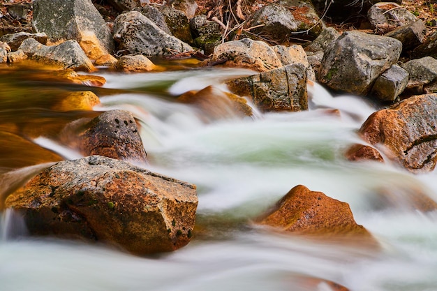 Stunning cascading river falls over rocks