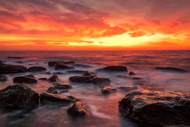 Stunning fire sunrise over the sea Horizontal view