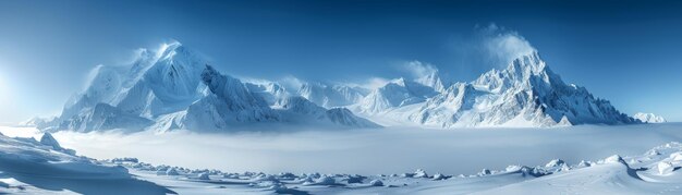 Photo stunning panorama of majestic snow covered mountains with clear blue sky and atmospheric clouds