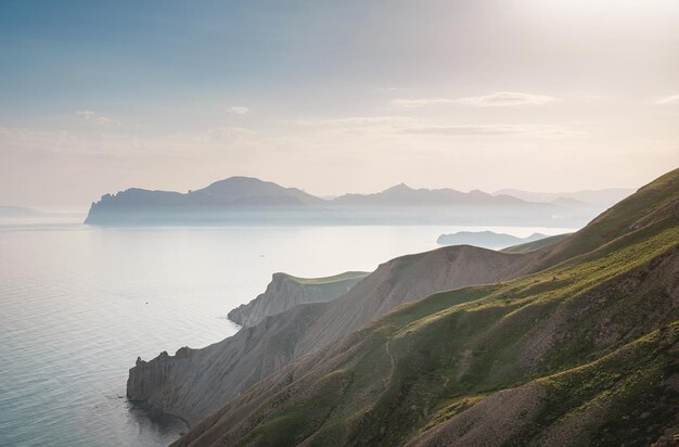 Stunning scenery in the sunset rays of the sea coast and mountains