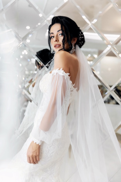 Photo stunning young bride holding bouquet, portrait