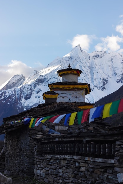 Stupa among stone houses in the Manaslu region Himalayas