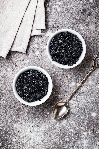 Sturgeon black caviar in bowls