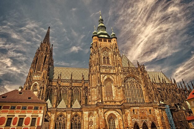 Stvitus cathedral in prague czech republic Church building on cloudy blue sky Monument of gothic architecture and design Vacation and wanderlust concept