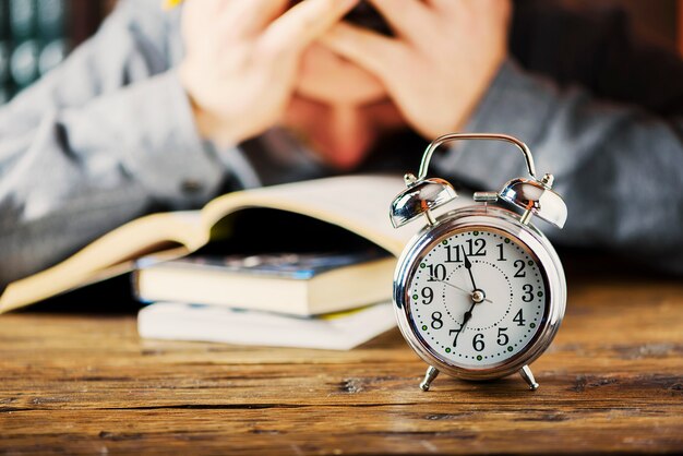 Stydying concept. student preparing late for his exams, selective focus