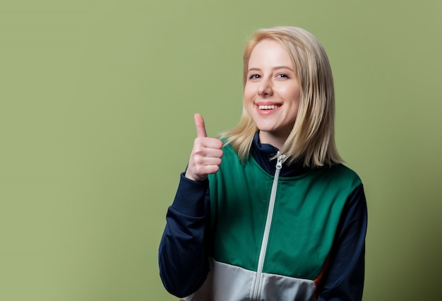 Style blonde woman in 80s clothes