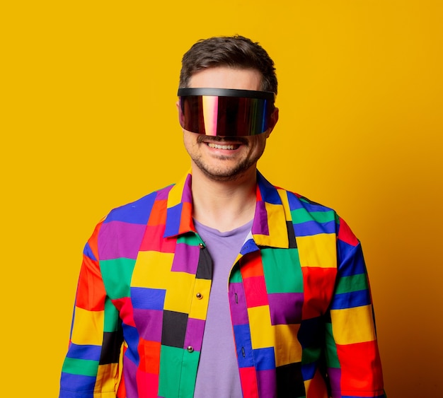 Style guy in 90s shirt and futuristic glasses